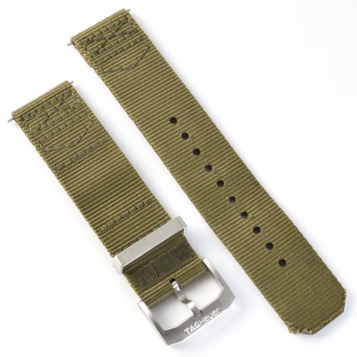 TAG Heuer Aquaracer green nylon watch strap with buckle showing visible stitching, metal keepers, and TAG Heuer engraved on the buckle